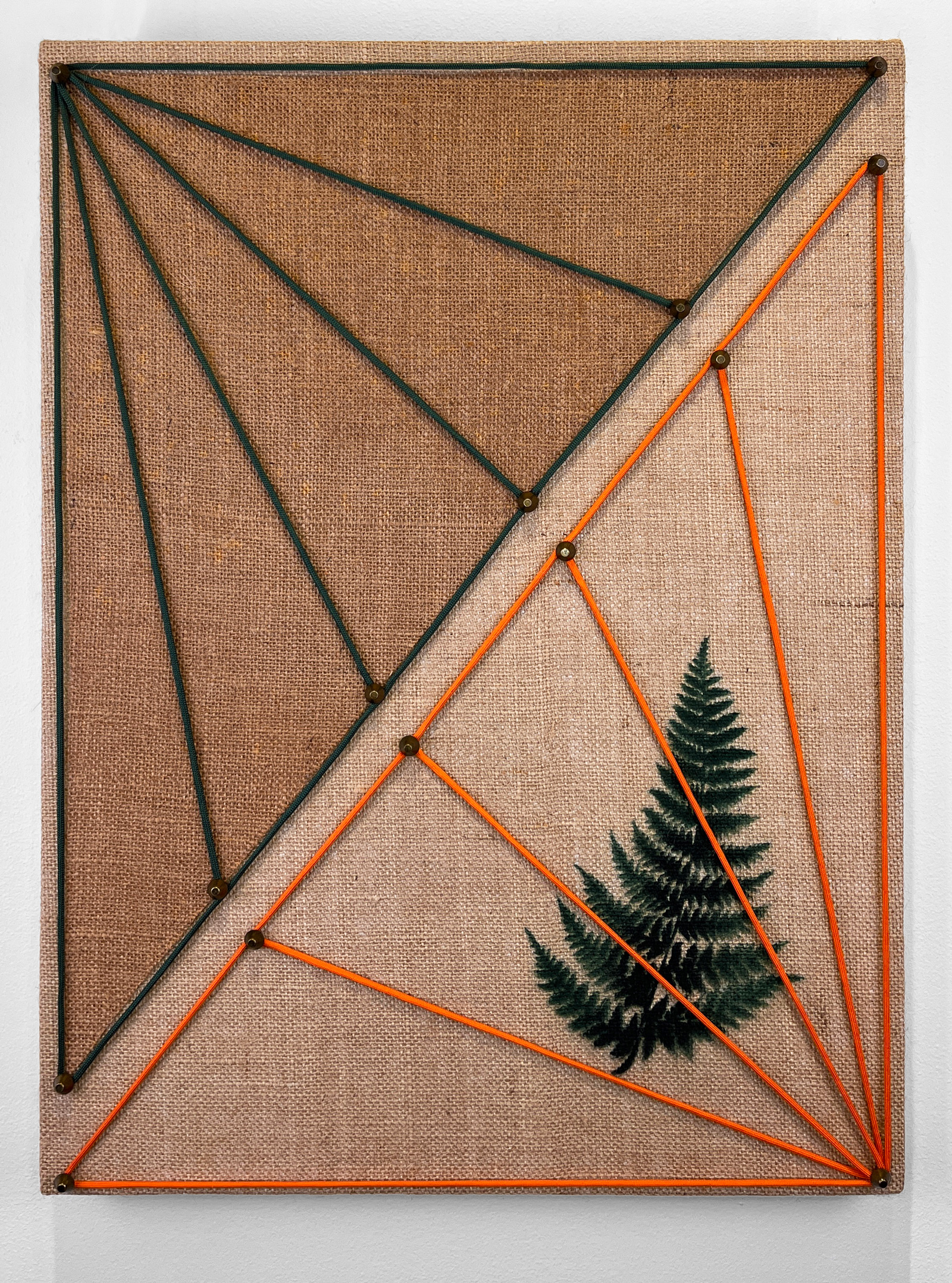 "Forest Cadency," 2022, spray paint, wood stain, paracord, notions, burlap on panel, 24in. x 18in.